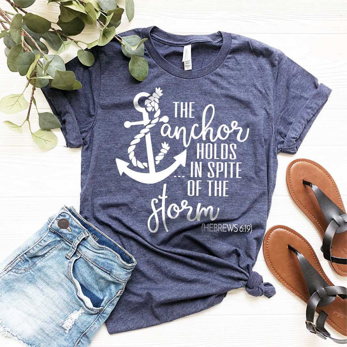 Christian T-Shirt, Hebrews 6:19 Shirt, Bible Verse Shirt, Faith Shirt, The Anchor Holds In Spite Of The Storm Shirt, Jesus Christ Tee - Fastdeliverytees.com